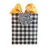 EverBow black ribbon bow styled on a wrapped gift with EverWrap EverBag