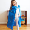 Child wearing the Sarah's Silks Star Cape during dress-up play