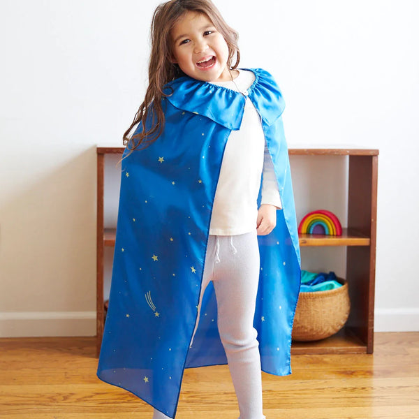 Child wearing the Sarah's Silks Star Cape during dress-up play