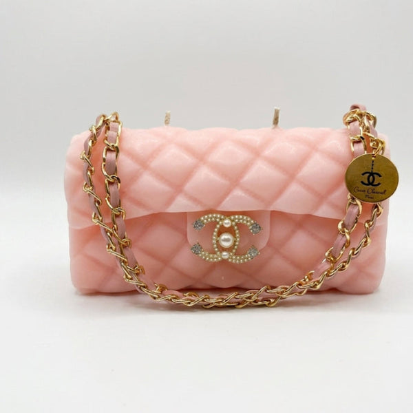 Close-up of The Rose Classic Couture candle showing elegant pink finish and wick detail