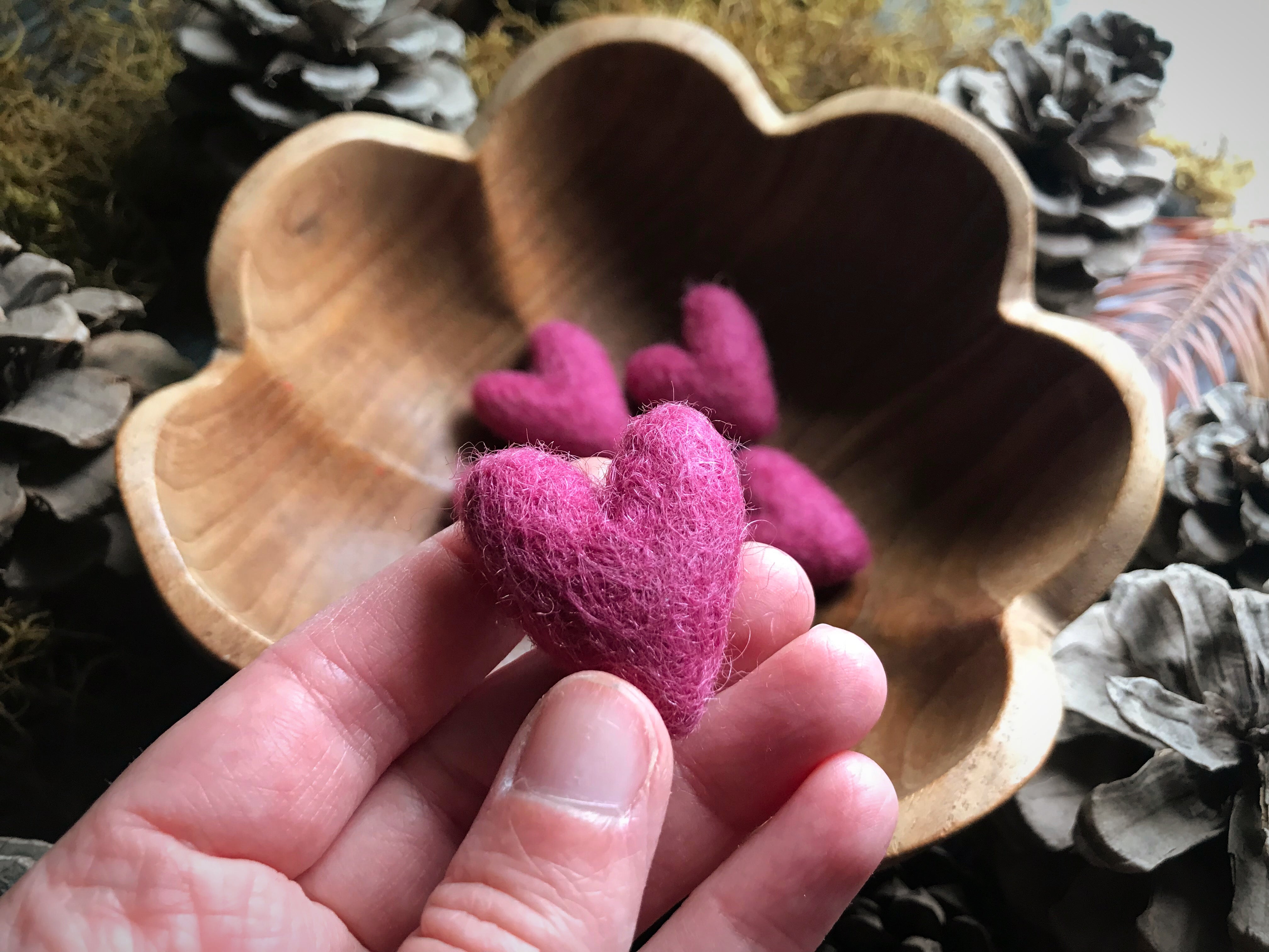 Close view of Wild Rose Pink needle-felted wool hearts