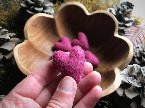 Close view of Wild Rose Pink needle-felted wool hearts