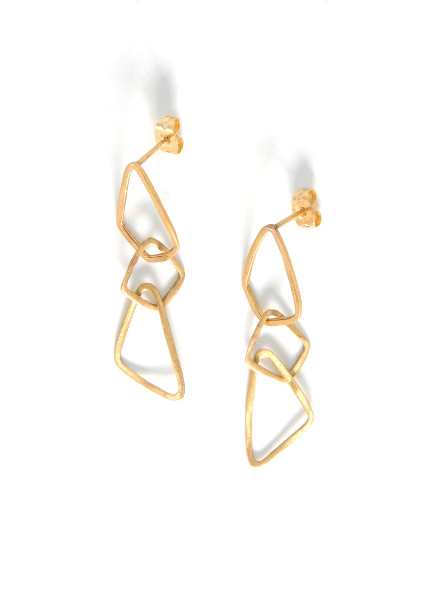 Close-up of nickel-free geometric brass dangle earrings showing recycled brass detail — Fair Anita