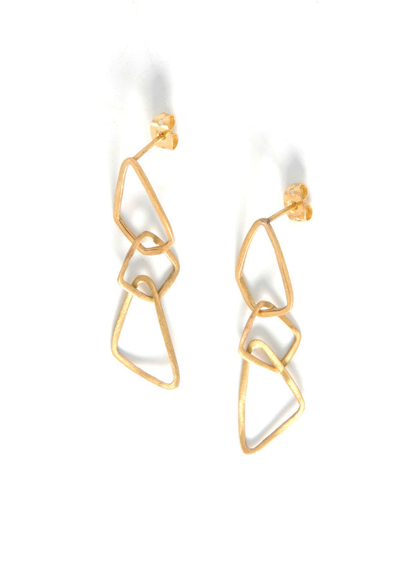 Close-up of nickel-free geometric brass dangle earrings showing recycled brass detail — Fair Anita