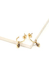 Detail view of smokey quartz pendant hoops in recycled brass, ethically made fair trade jewellery