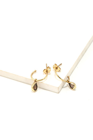 Detail view of smokey quartz pendant hoops in recycled brass, ethically made fair trade jewellery