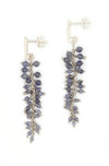 Model wearing iolite cluster drop earrings by Fair Anita, fair trade jewellery