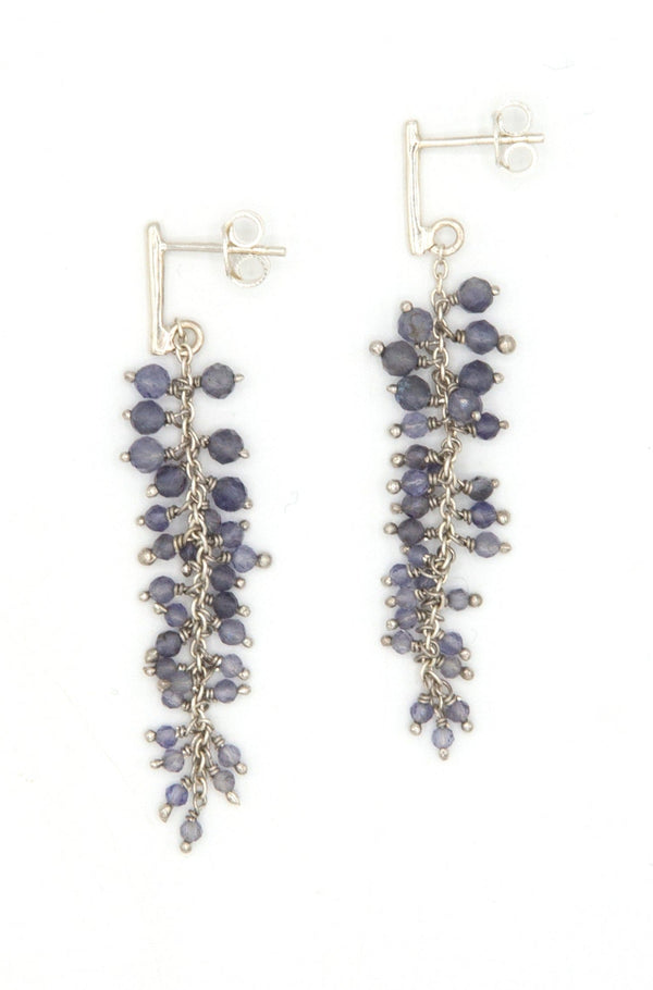 Model wearing iolite cluster drop earrings by Fair Anita, fair trade jewellery