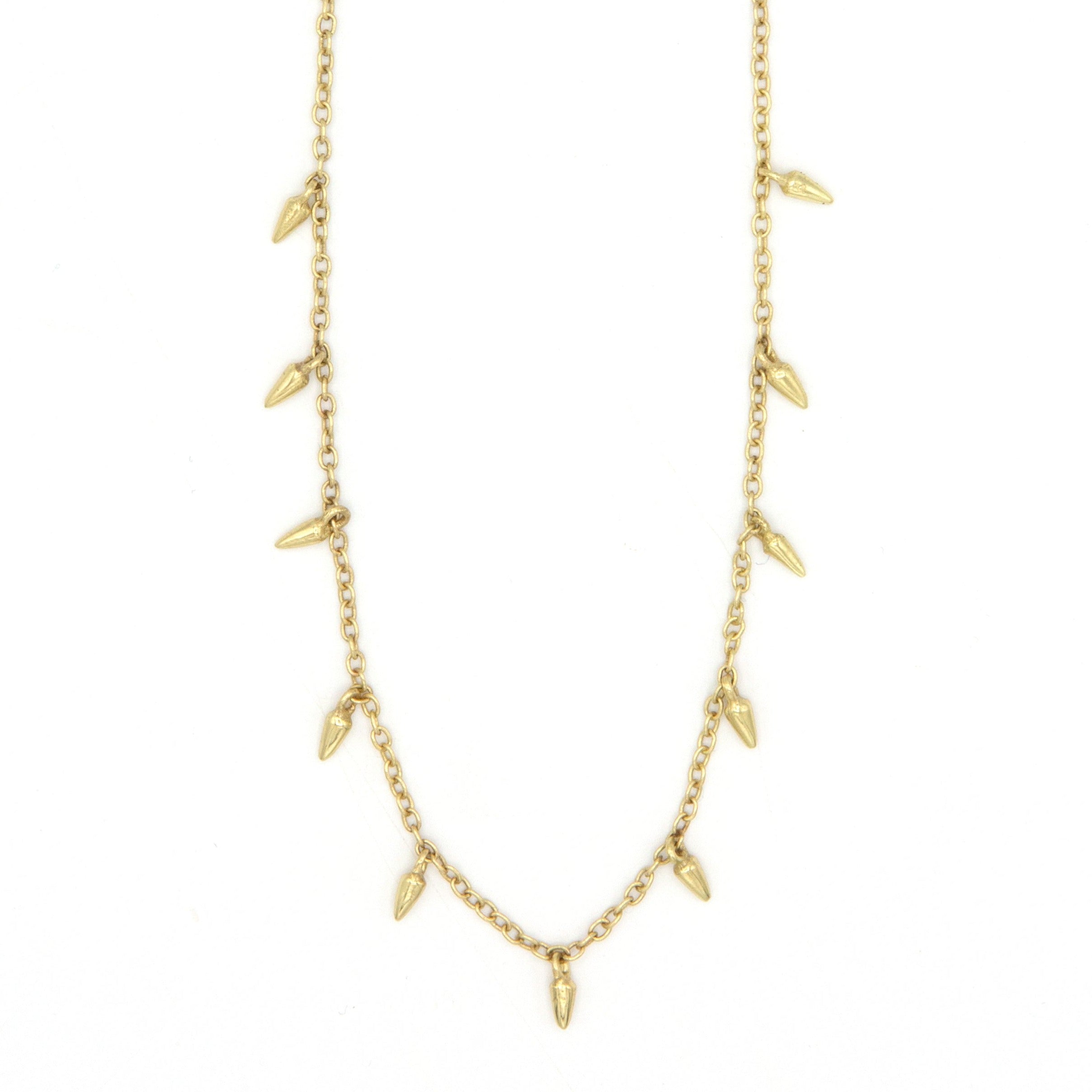Spike Charm Necklace in sterling silver worn as a layered necklace, fair trade handcrafted in India