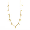 Spike Charm Necklace in sterling silver worn as a layered necklace, fair trade handcrafted in India