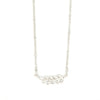 Close-up of fair trade fern necklace gold plating and chain extender