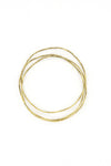 Tidalwave Hammered Brass Bangle Set worn stacked on wrist – sustainable fair trade jewellery by Fair Anita