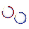 Close-up of Fair Anita Summer Lovin' beaded hoop earrings showing vibrant glass bead detail