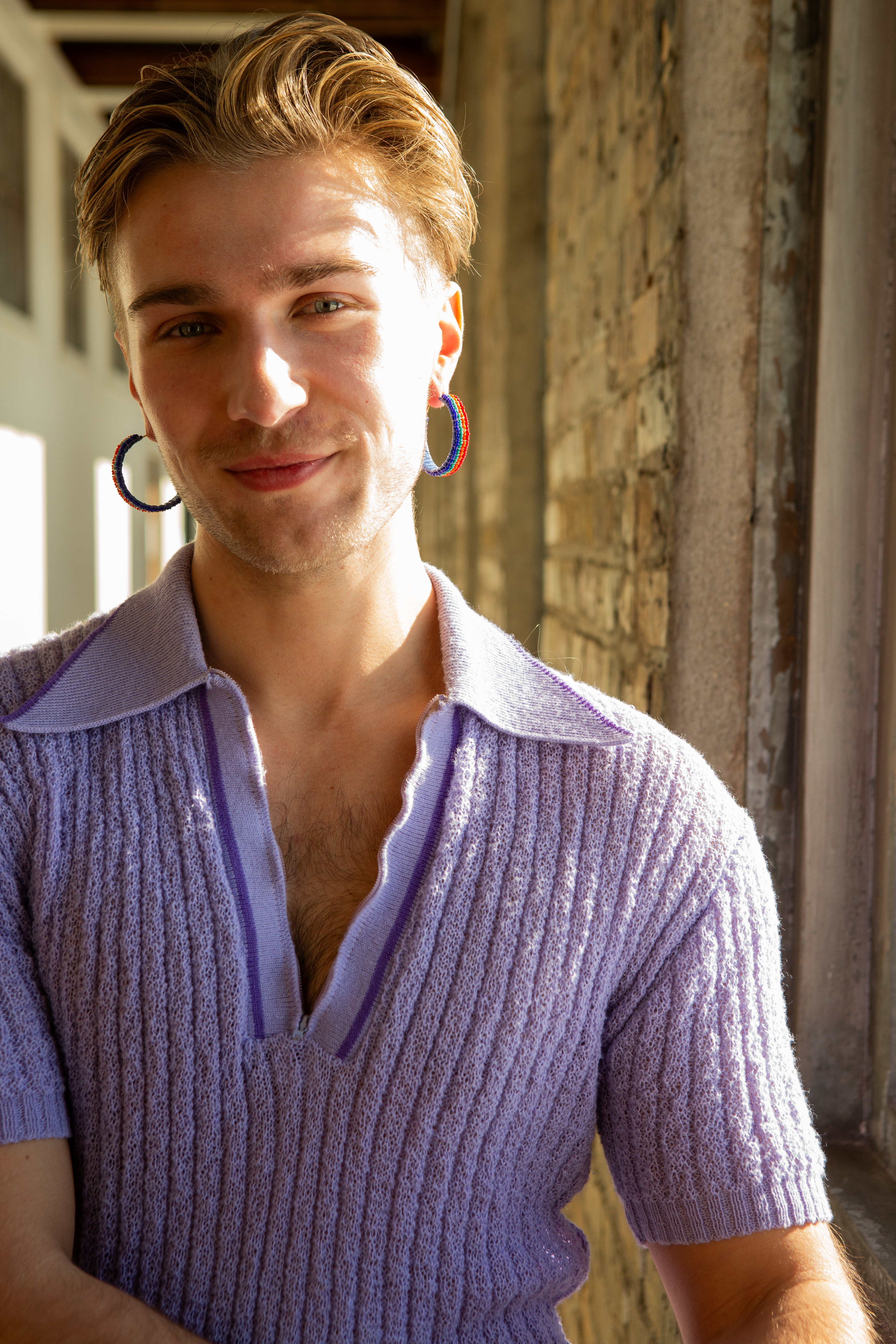Model wearing Fair Anita Summer Lovin' colourful glass bead hoop earrings, ethically handcrafted in India