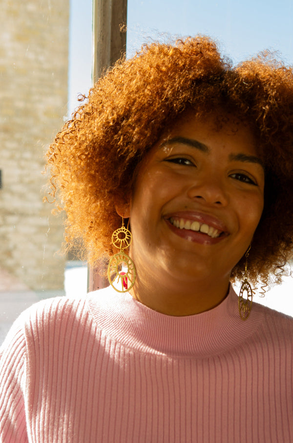 Close-up of Sol Statement Earrings showing recycled brass detail and finish