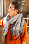 Close-up of Fair Anita graphite striped scarf showing woven cotton texture and bold stripe detail
