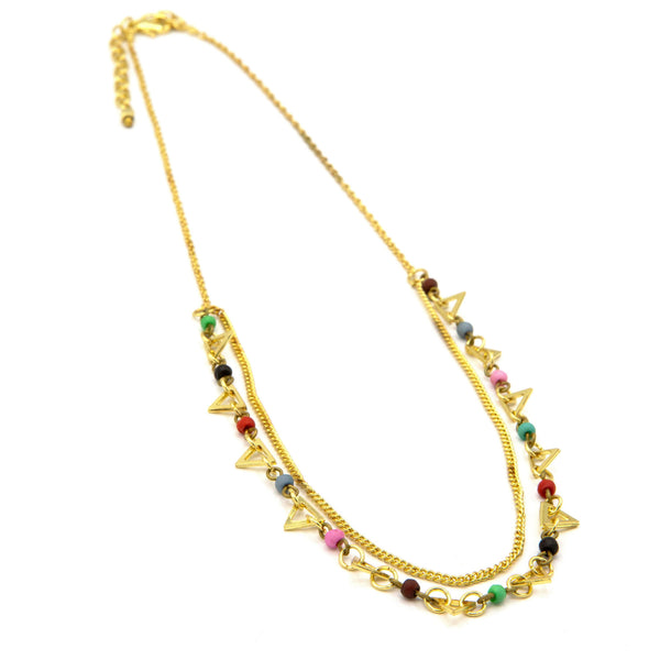Confetti Dual Strand Necklace in gold-plated recycled brass worn as a layered statement piece