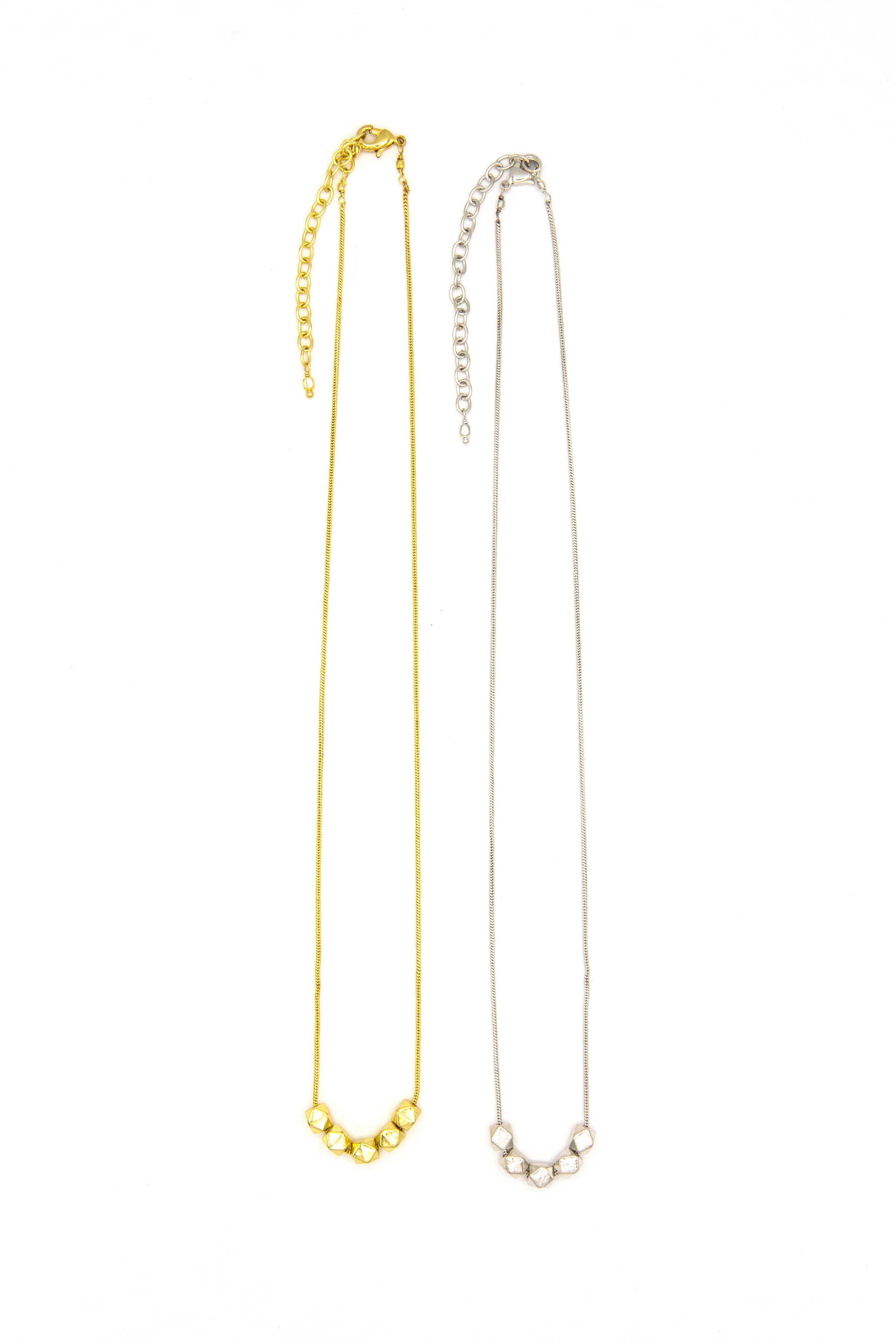 Fair Anita Glow Lite Necklace flat lay showing gold-plated recycled brass finish and adjustable chain