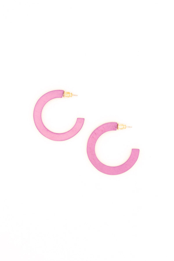 Flat lay of upcycled bone hoop earrings from Fair Anita's India Collection — slow fashion jewellery