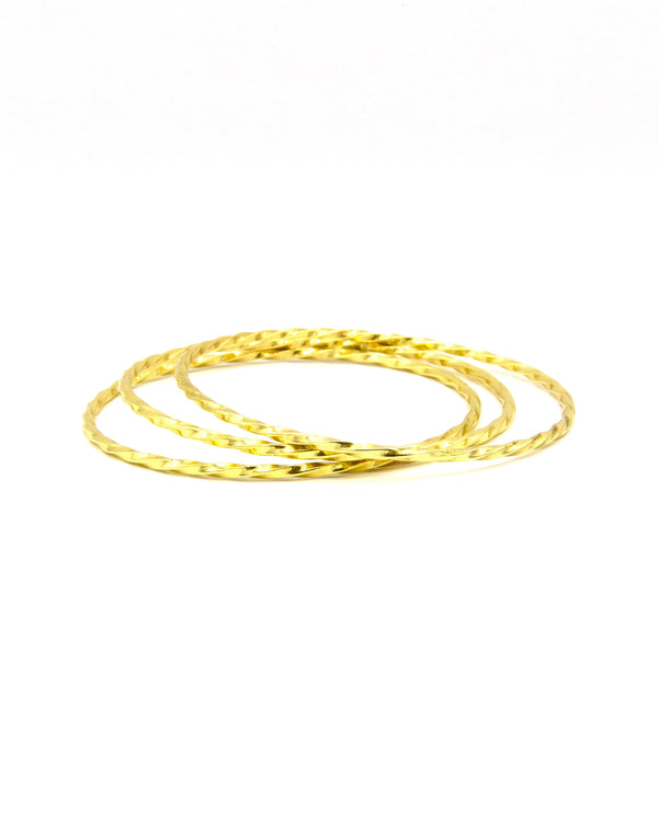 Fair Anita Twist Bangle Set – set of three brass-plated recycled metal bangles with twisted texture design
