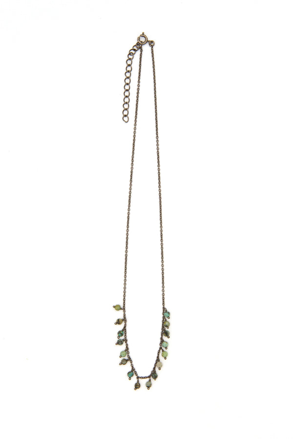 Close-up of Turquoise Drop Luxe Necklace showing natural turquoise stone drop and nickel-free rhodium chain detail