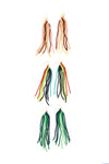 Boho fringe earrings with multicoloured glass beads on a neutral background