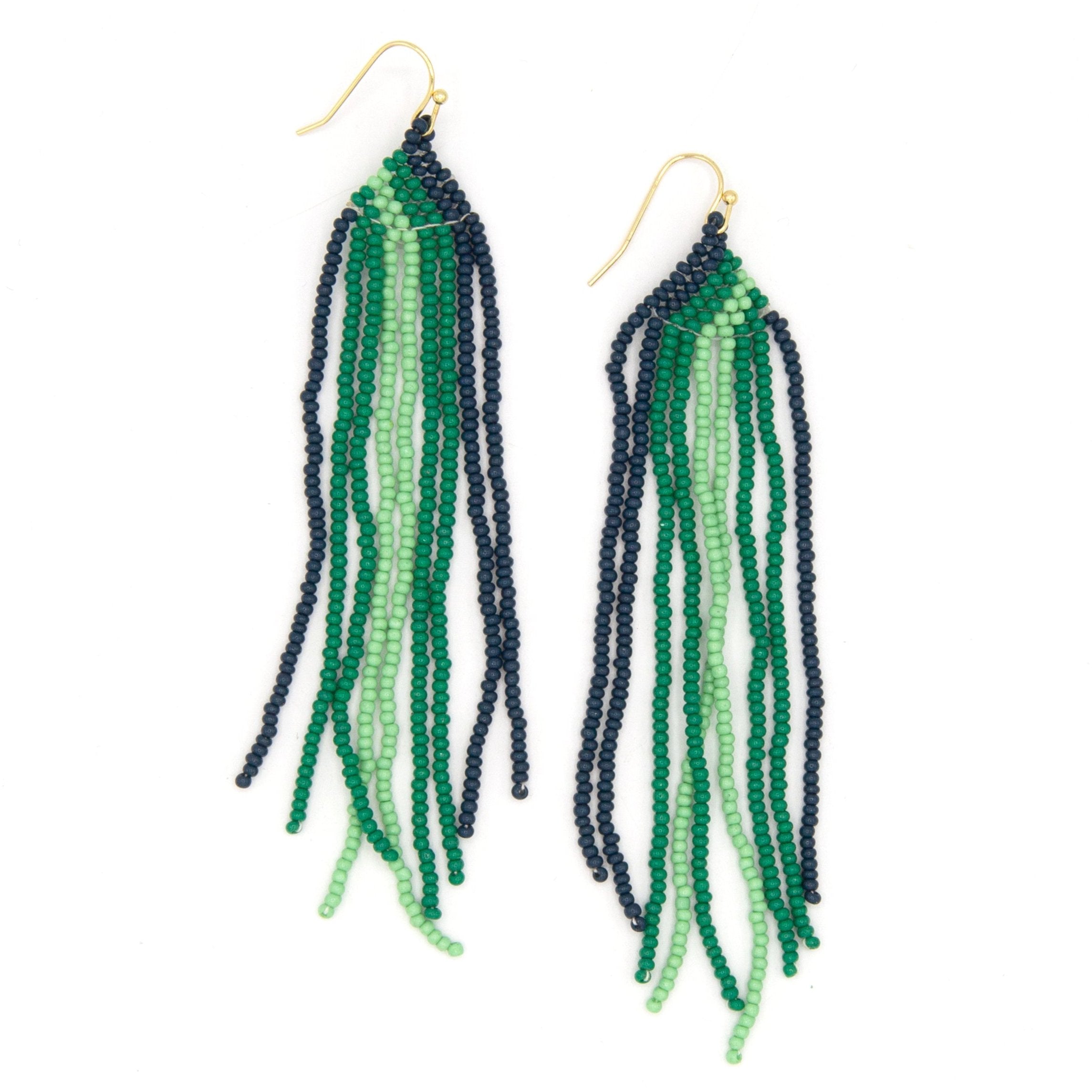 Fair trade beaded drop earrings styled on a model, showing full 4.25 inch length