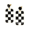 Black and white checkered resin drop earrings handcrafted by Fair Anita fair trade artisans