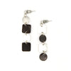 Square the Circle mismatched geometric drop earrings in black and silver recycled metal by Fair Anita