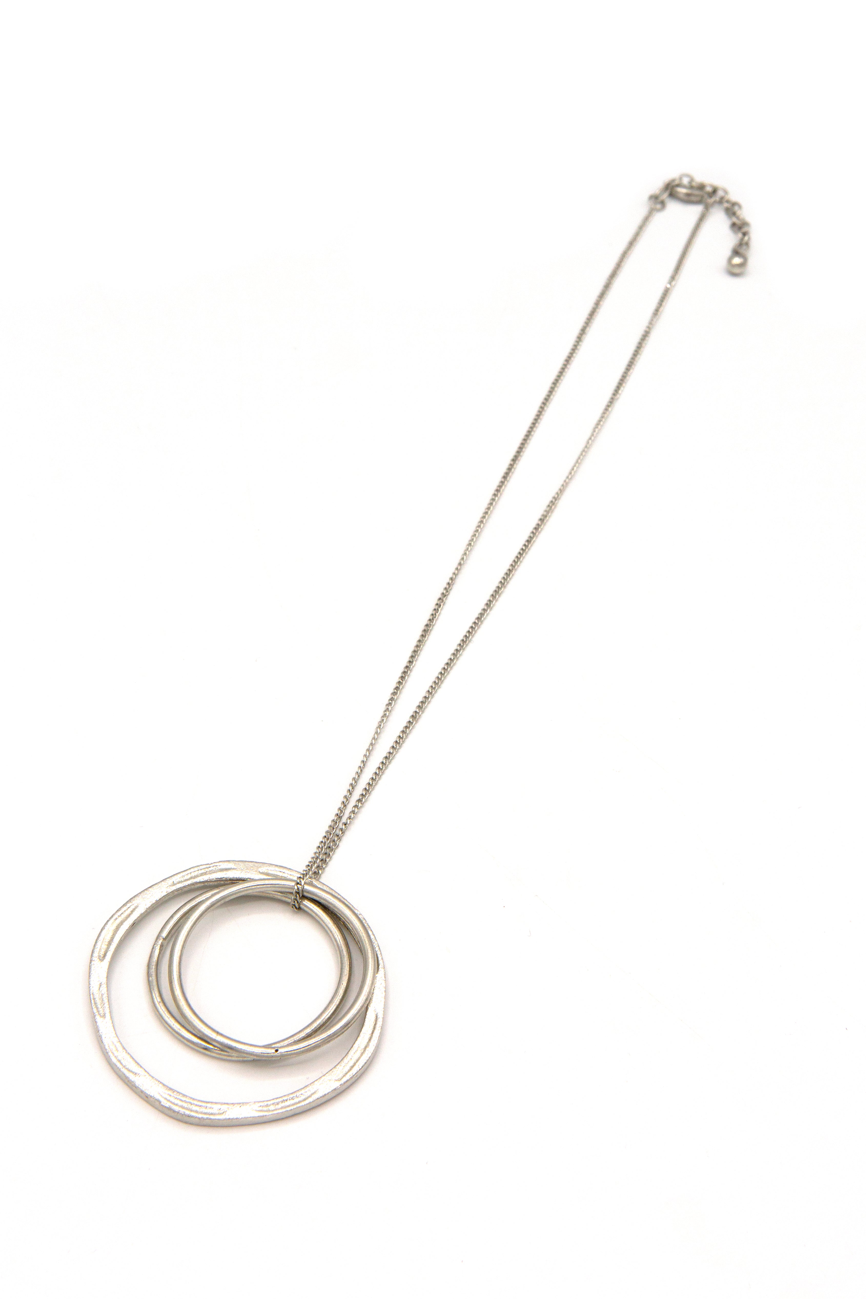 Fair Anita Linked Rings Pendant Necklace detail shot showing recycled brass pendant and chain length