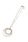 Fair Anita Linked Rings Pendant Necklace detail shot showing recycled brass pendant and chain length
