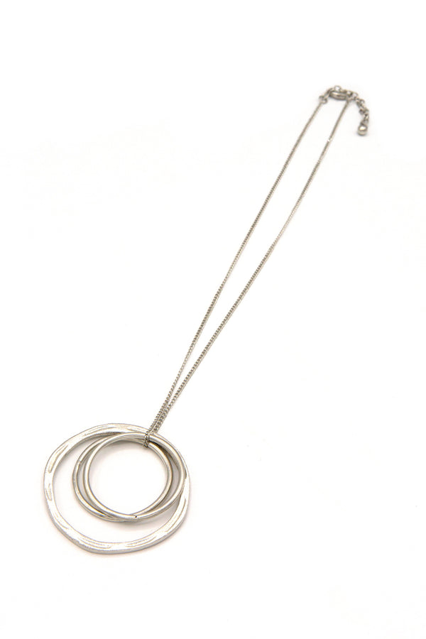Fair Anita Linked Rings Pendant Necklace detail shot showing recycled brass pendant and chain length