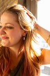 Close-up of natural freshwater pearl earrings handmade by women artisans in India for Fair Anita