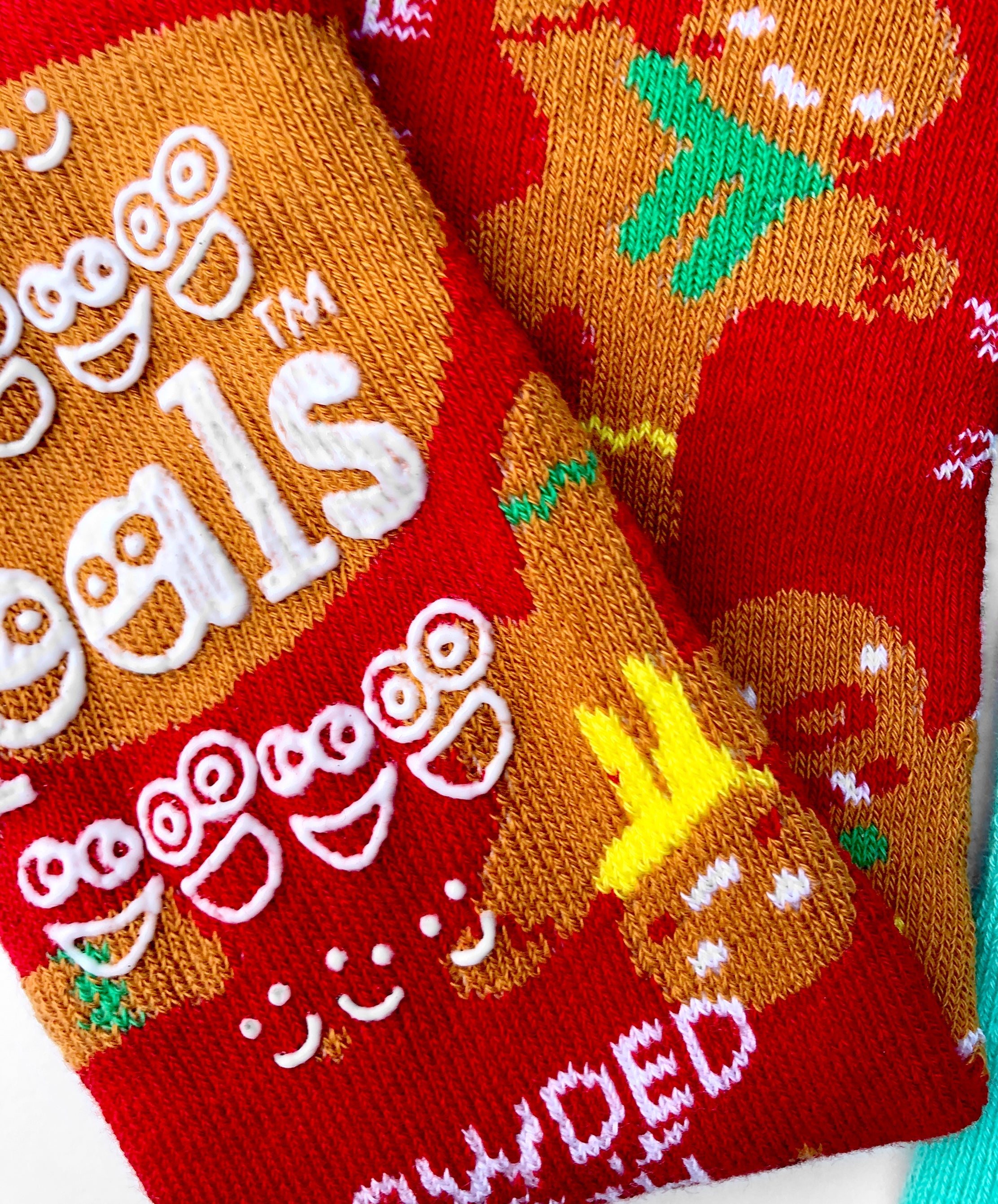 Add a touch of holiday cheer to your wardrobe with our Gingerbread & Candy Cane mismatched socks. These cozy and comfortable socks are perfect for the whole family.