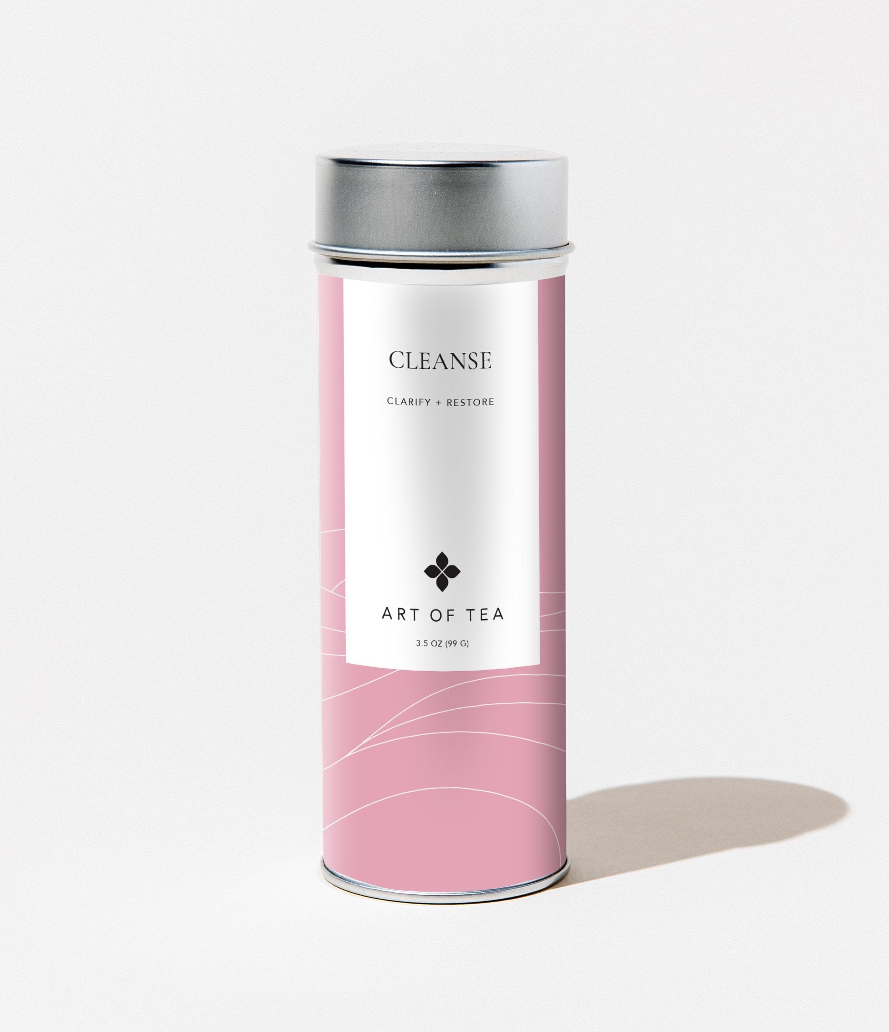 Pink tea canister with silver lid labeled 'Cleanse' by 'Art of Tea' on a white background