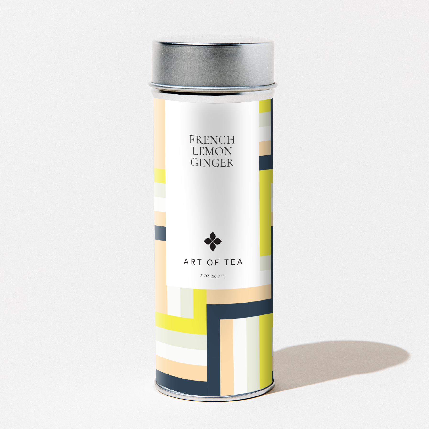 Art of Tea French Lemon Ginger loose leaf herbal tea in a geometric-design canister on a white background