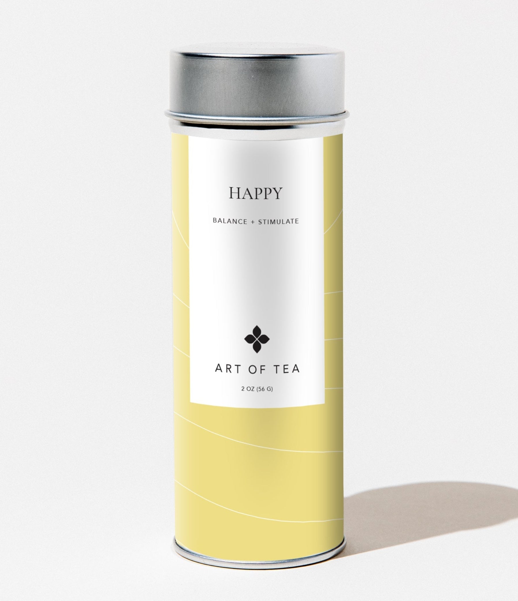 Art of Tea Happy Tea yellow canister with silver lid on a white background