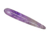 Close-up of polished amethyst yoni wand showing natural crystal colour and texture