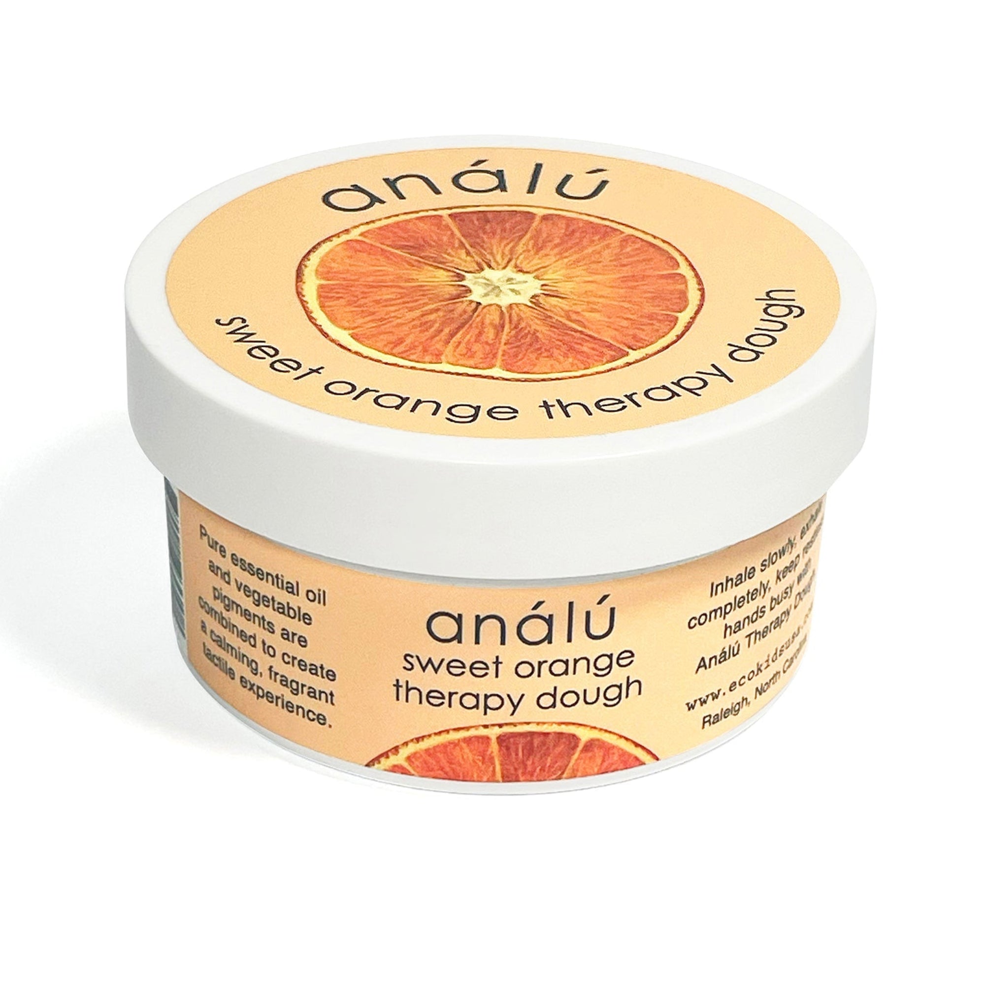 Child's hands squeezing Analu Sweet Orange therapy dough for sensory stress relief