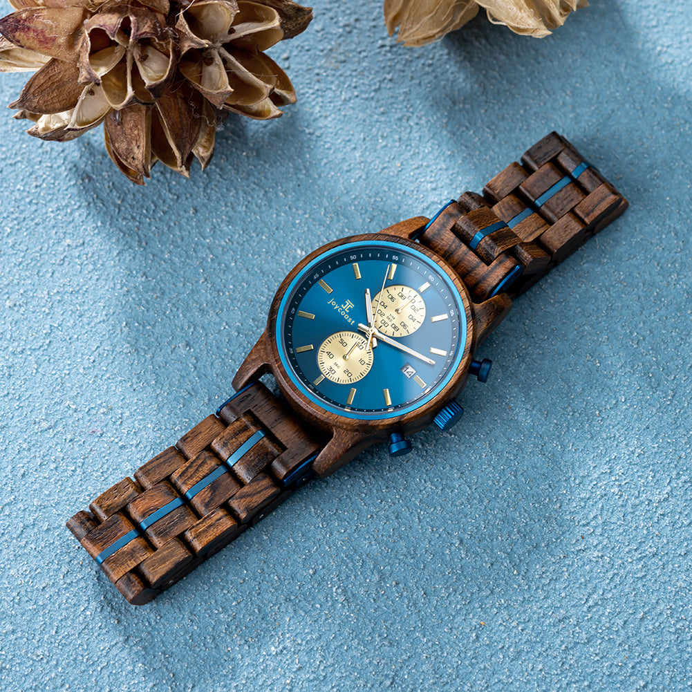 Aries zebrawood chronograph watch laid flat showing unique wood grain detail and watch face