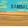 Pack of incense sticks with a blue label featuring text about 'Pure Australian Sandalwood'.