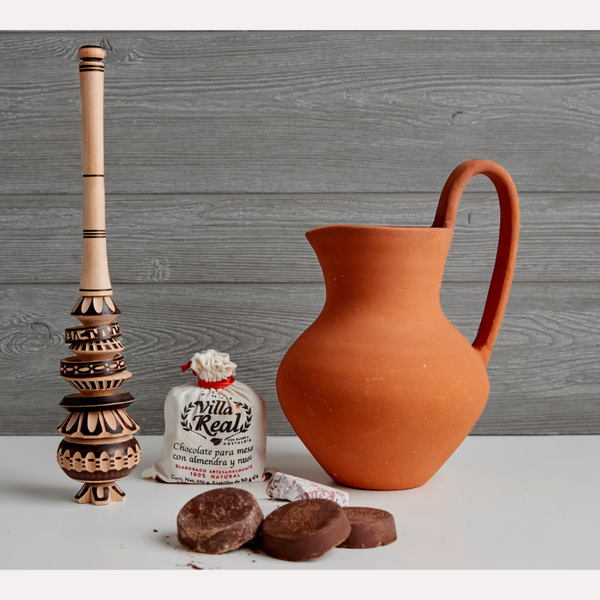 Verve Culture's Authentic Mexican Hot Chocolate Gift Set includes everything you need for a luxurious hot chocolate experience. Handcrafted chocolate, a traditional clay jug, and a wooden molinillo whisk create a rich and frothy drink, steeped in Mexican tradition. Order yours today!