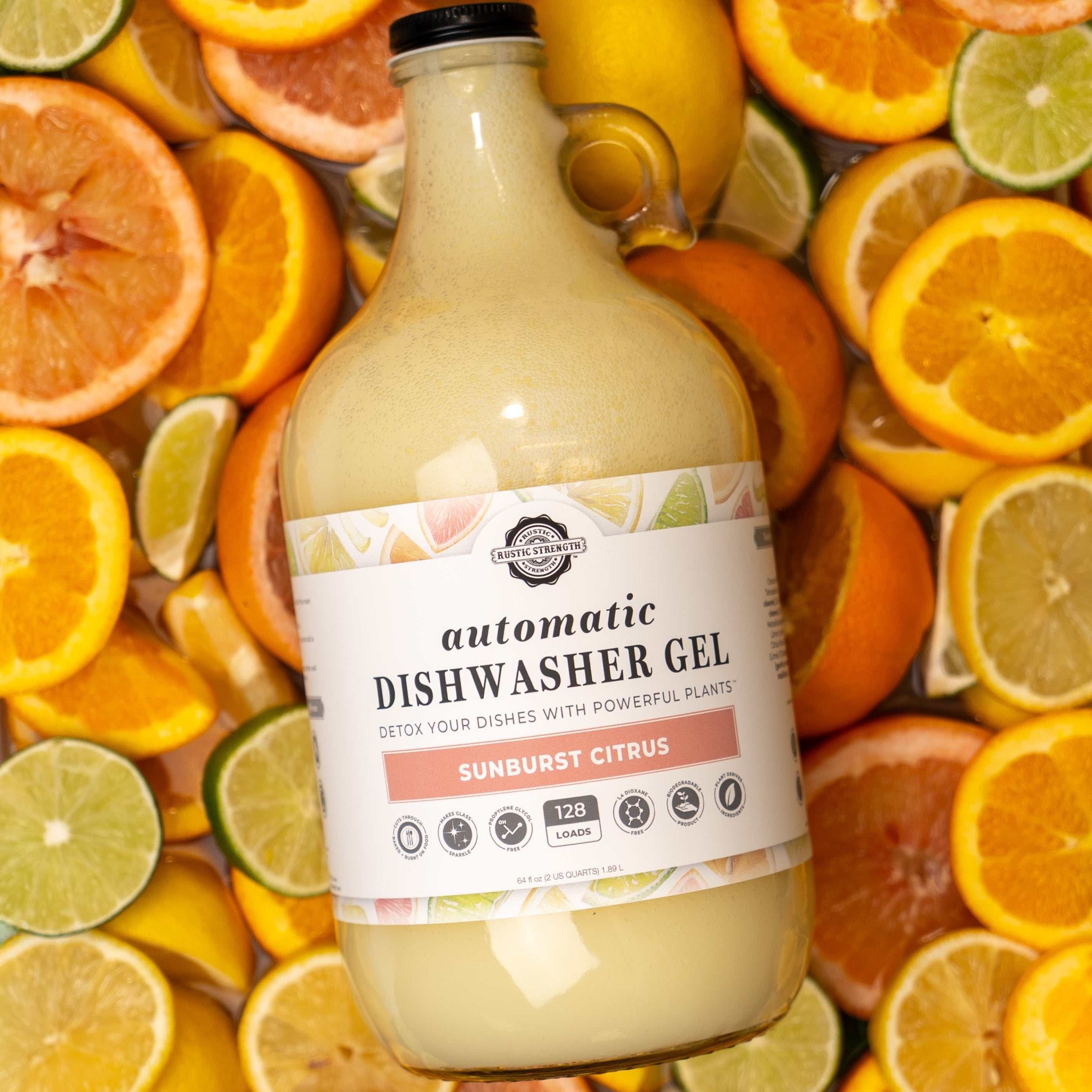 Bottle of dishwasher gel surrounded by citrus fruits on a colorful background