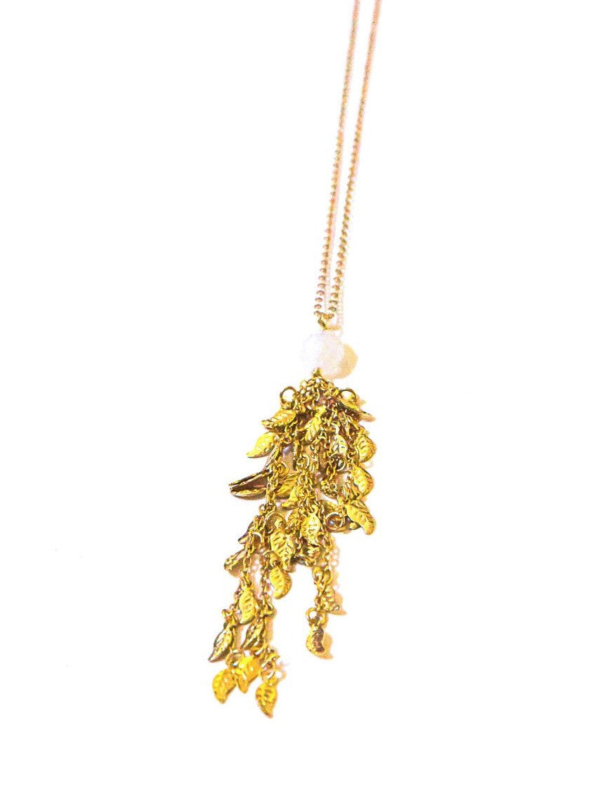 Autumn Day Moonstone Necklace with recycled brass leaf tassel by Fair Anita, worn as a long boho pendant necklace