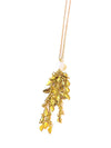 Autumn Day Moonstone Necklace with recycled brass leaf tassel by Fair Anita, worn as a long boho pendant necklace