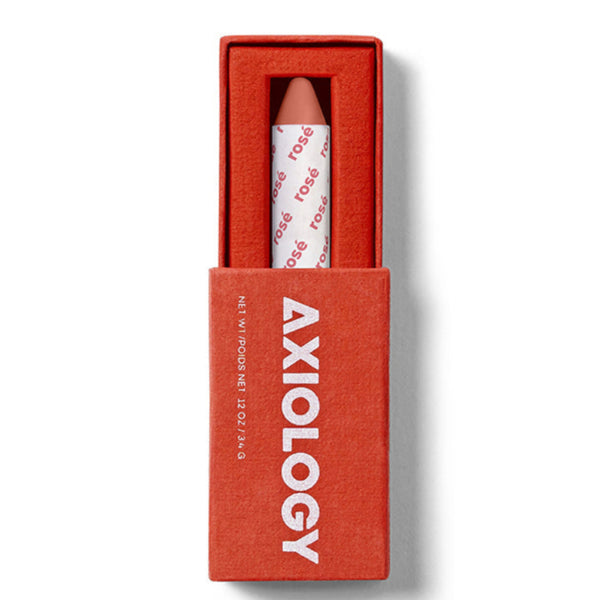 Lipstick in a red box with 'Axiology' branding on a white background