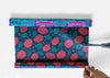 Meli Wraps Dragonfruit print beeswax wrap bulk roll unrolled on a white surface showing full length