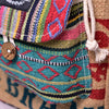 Mini Recycled Travel Backpack Agra Special shown from a different angle highlighting its one-of-a-kind pattern