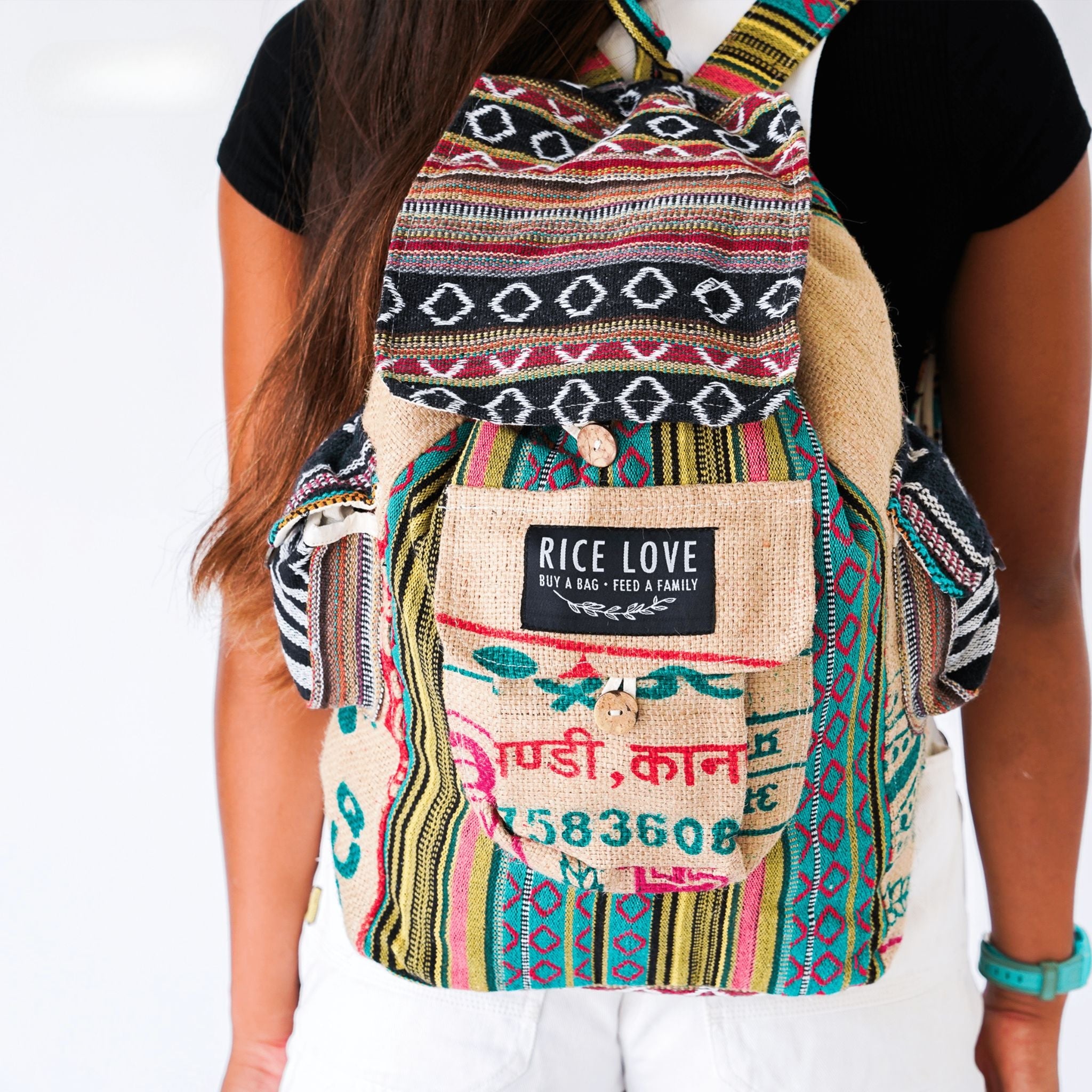 Recycled Travel Backpack Kochi shown from a side angle highlighting its fair trade construction
