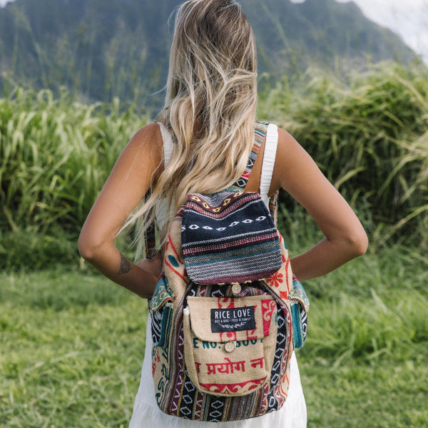 Side view of the Recycled Travel Backpack Mumbai showing burlap texture